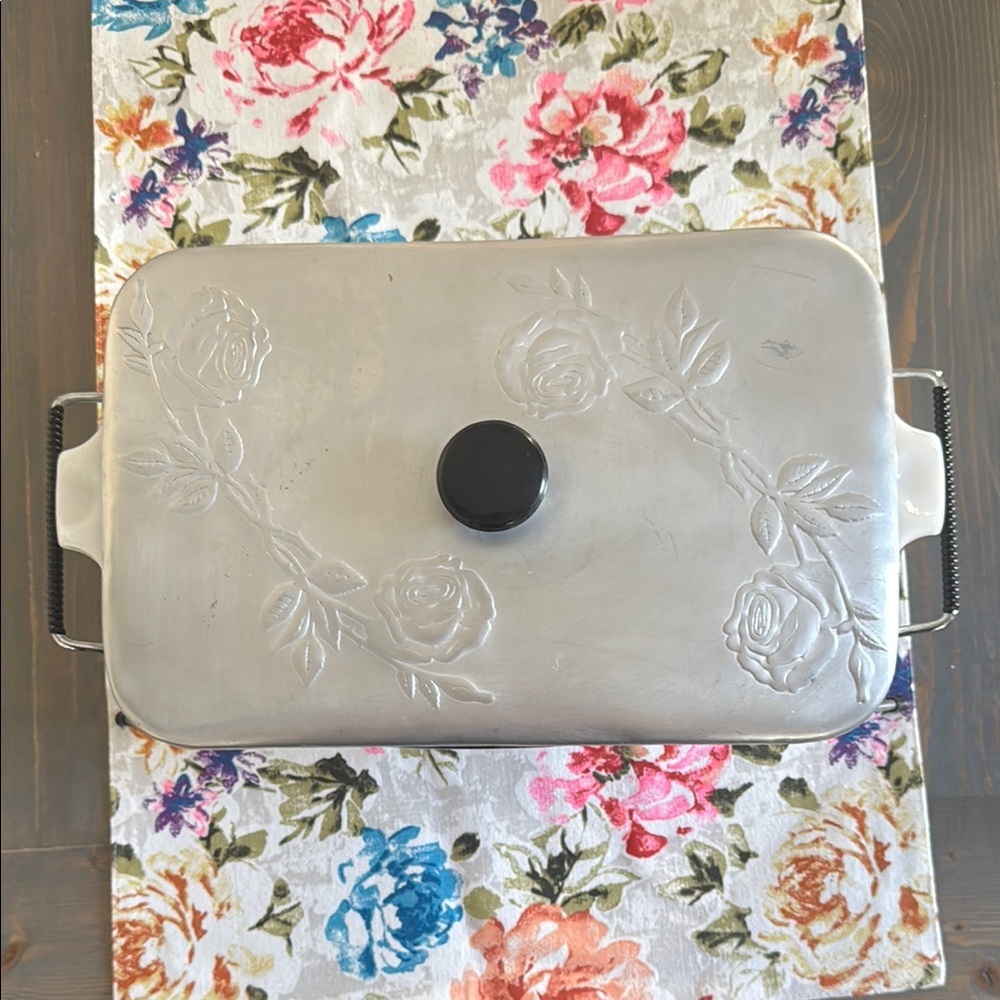 Vintage Glasbake 2 1/2 quart divided casserole dish with aluminum rose lid